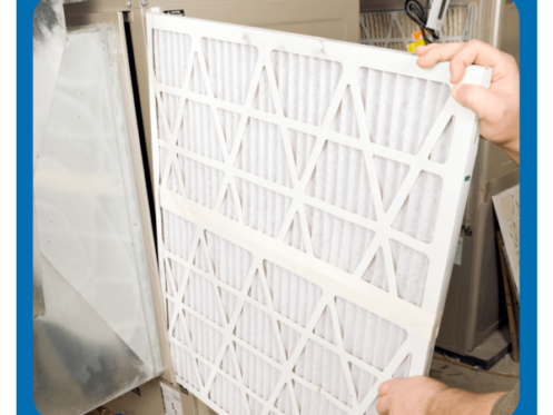 Changing Air Filter During HVAC Maintenance in Newburgh, NY